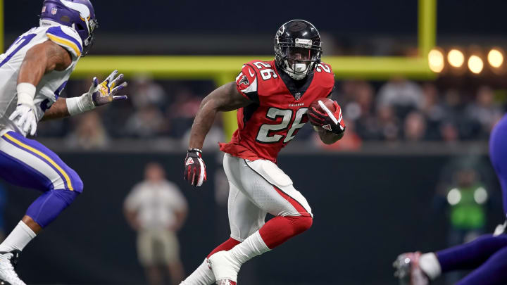 ATLANTA, GA – DECEMBER 03: Atlanta Falcons running back Tevin Coleman (26) runs with the football during an NFL football game between the Minnesota Vikings and Atlanta Falcons on December 3, 2017 at Mercedes-Benz Stadium in Atlanta, GA. (Photo by Robin Alam/Icon Sportswire via Getty Images)