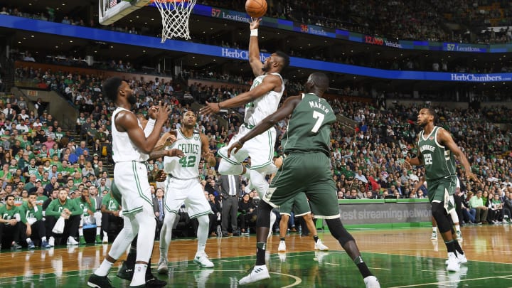 BOSTON, MA - APRIL 28: Semi Ojeleye #37 of the Boston Celtics goes to the basket against the Milwaukee Bucks in Game Seven of Round One of the 2018 NBA. Playoffs on April 28, 2018 at the TD Garden in Boston, Massachusetts. NOTE TO USER: User expressly acknowledges and agrees that, by downloading and or using this photograph, User is consenting to the terms and conditions of the Getty Images License Agreement. Mandatory Copyright Notice: Copyright 2018 NBAE (Photo by Brian Babineau/NBAE via Getty Images)