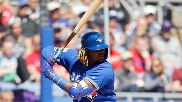 DUNEDIN, FLORIDA - MARCH 06: Vladimir Guerrero Jr. #27 of the Toronto Blue Jays in action against the Philadelphia Phillies during the Grapefruit League spring training game at Dunedin Stadium on March 06, 2019 in Dunedin, Florida. (Photo by Michael Reaves/Getty Images)