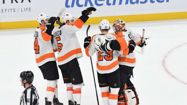BOSTON, MA - NOVEMBER 10: The Philadelphia Flyers celebrate the shoot out win against the Boston Bruins at the TD Garden on November 10, 2019 in Boston, Massachusetts. (Photo by Steve Babineau/NHLI via Getty Images)