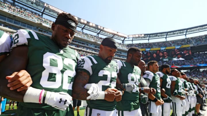 EAST RUTHERFORD, NJ - SEPTEMBER 24: Will Tye #82, Matt Forte #22 and Neal Sterling #85 of the New York Jets stand in unison during the National Anthem prior to an NFL game against the Miami Dolphins at MetLife Stadium on September 24, 2017 in East Rutherford, New Jersey. (Photo by Al Bello/Getty Images)