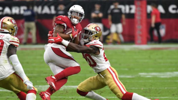 GLENDALE, AZ – OCTOBER 28: Cornerback Jimmie Ward #20 of the San Francisco 49ers tackles wide receiver Christian Kirk #13 of the Arizona Cardinals during the second quarter at State Farm Stadium on October 28, 2018 in Glendale, Arizona. (Photo by Norm Hall/Getty Images)