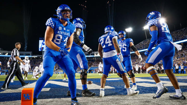 Oct 15, 2022; Lexington, Kentucky, USA; Kentucky Wildcats tight end Josh Kattus (84) celebrates after running back Chris Rodriguez Jr. (24) scores a touchdown during the fourth quarter against the Mississippi State Bulldogs at Kroger Field. Mandatory Credit: Jordan Prather-USA TODAY Sports