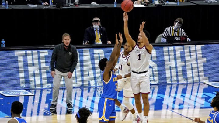 Apr 3, 2021; Indianapolis, Indiana, USA; Gonzaga Bulldogs guard Jalen Suggs (1) shoots the game winning shot against UCLA Bruins guard David Singleton (34) during overtime in the national semifinals of the Final Four of the 2021 NCAA Tournament at Lucas Oil Stadium. Mandatory Credit: Robert Deutsch-USA TODAY Sports