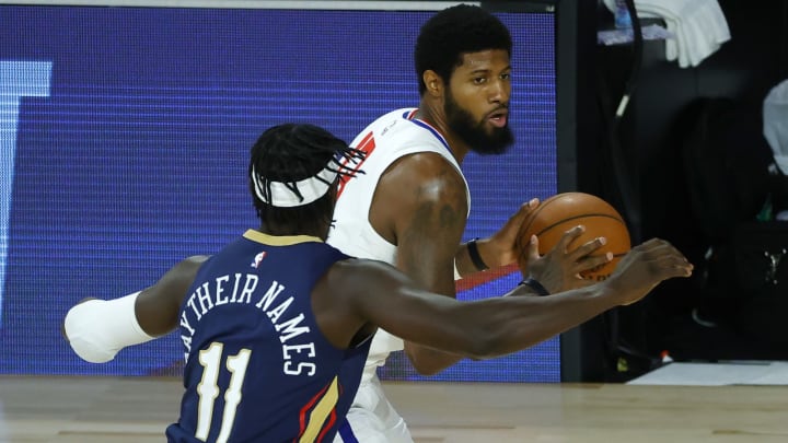 LA Clippers Paul George and New Orleans Pelicans Jrue Holiday