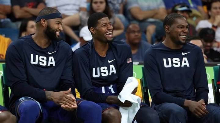 Aug 6, 2016; Rio de Janeiro, Brazil; United States center Demarcus Cousins (12), United States guard Paul George (13) and United States forward Kevin Durant (5) laugh on the bench during the game China in the men's basketball group A preliminary round during the Rio 2016 Summer Olympic Games at Carioca Arena 1. Mandatory Credit: Jason Getz-USA TODAY Sports Aug 6, 2016; Rio de Janeiro, Brazil; United States center Demarcus Cousins (12), United States guard Paul George (13) and United States forward Kevin Durant (5) laugh on the bench during the game China in the men's basketball group A preliminary round during the Rio 2016 Summer Olympic Games at Carioca Arena 1. Mandatory Credit: Jason Getz-USA TODAY Sports