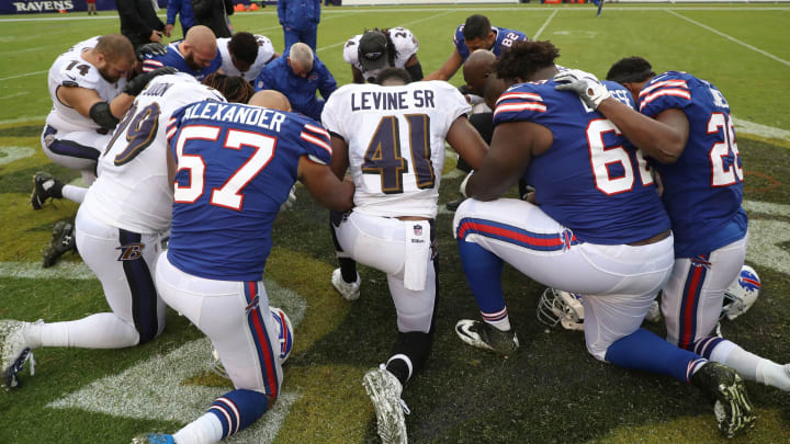 BALTIMORE, MD – SEPTEMBER 9: After the 47-3 Baltimore Ravens win over the Buffalo Bills members of both teams pray at M&T Bank Stadium on September 9, 2018 in Baltimore, Maryland. (Photo by Rob Carr/Getty Images)