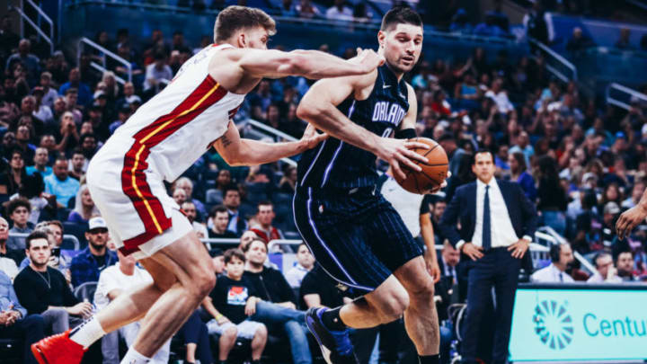 Nikola Vucevic #9 of the Orlando Magic faces off with Meyers Leonard #0 of the Miami Heat (Photo by Harry Aaron/Getty Images)