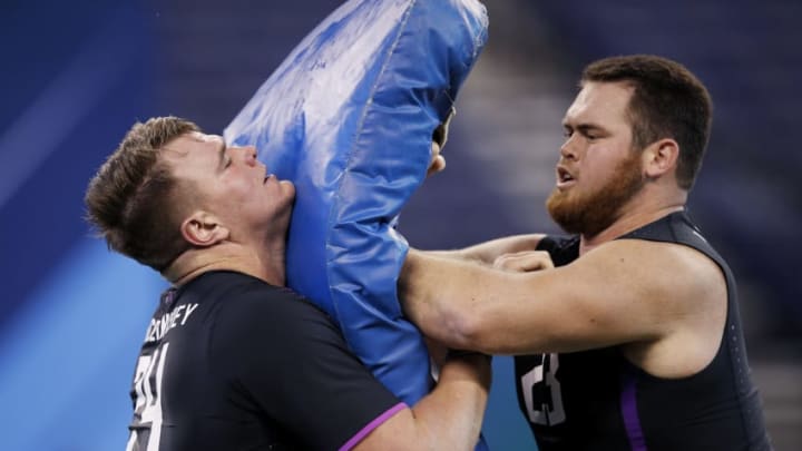 INDIANAPOLIS, IN - MARCH 02: Notre Dame offensive lineman Mike McGlinchey battles with Miami offensive lineman KC McDermott during the 2018 NFL Combine at Lucas Oil Stadium on March 2, 2018 in Indianapolis, Indiana. (Photo by Joe Robbins/Getty Images)