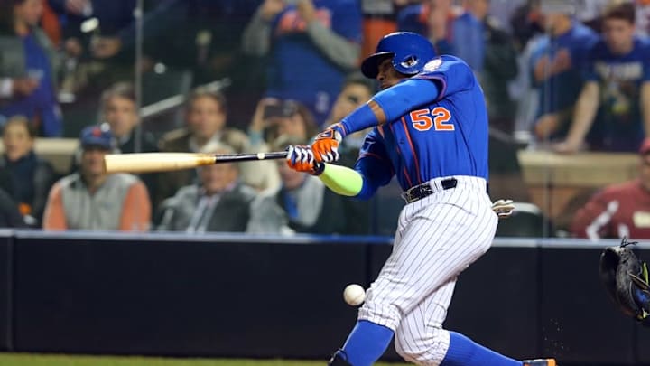 Nov 1, 2015; New York City, NY, USA; New York Mets center fielder Yoenis Cespedes (52) fouls a ball off his knee in the 6th inning against the Kansas City Royals in game five of the World Series at Citi Field. Mandatory Credit: Brad Penner-USA TODAY Sports