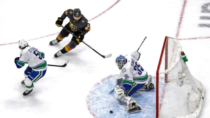 EDMONTON, ALBERTA - SEPTEMBER 04: Thatcher Demko #35 of the Vancouver Canucks stops a shot against Chandler Stephenson #20 of the Vegas Golden Knights during the first period in Game Seven of the Western Conference Second Round during the 2020 NHL Stanley Cup Playoffs at Rogers Place on September 04, 2020 in Edmonton, Alberta, Canada. (Photo by Bruce Bennett/Getty Images)
