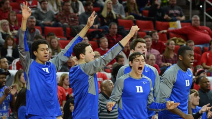 Jan 23, 2016; Raleigh, NC, USA; The Duke Blue Devils bench reacts to a three pointer during the second half against the North Carolina State Wolfpack at PNC Arena. Duke won 88-78. Mandatory Credit: Rob Kinnan-USA TODAY Sports