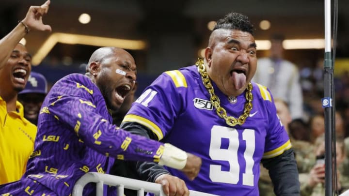 ATLANTA, GEORGIA - DECEMBER 07: LSU Tigers fans cheer during the SEC Championship game between the LSU Tigers and the Georgia Bulldogs at Mercedes-Benz Stadium on December 07, 2019 in Atlanta, Georgia. (Photo by Kevin C. Cox/Getty Images)
