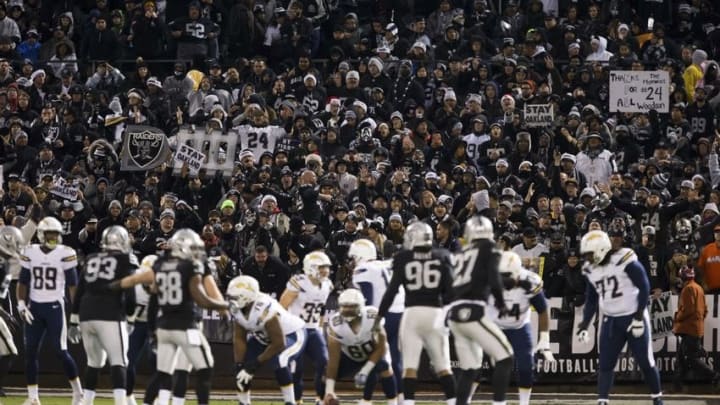 Dec 24, 2015; Oakland, CA, USA; Oakland Raiders fans as the San Diego Chargers line up during the third quarter at O.co Coliseum. The Oakland Raiders defeated the San Diego Chargers 23-20. Mandatory Credit: Kelley L Cox-USA TODAY Sports