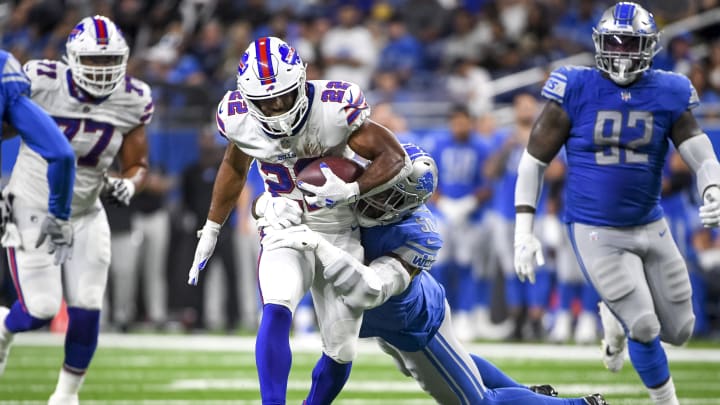 DETROIT, MICHIGAN – AUGUST 13: Shaun Dion Hamilton #50 of the Detroit Lions tackles Matt Breida #22 of the Buffalo Bills during the second quarter of a preseason game at Ford Field on August 13, 2021 in Detroit, Michigan. (Photo by Nic Antaya/Getty Images)