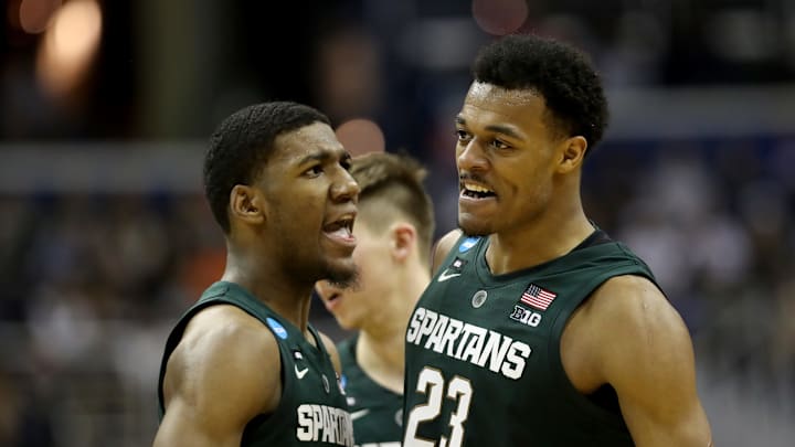 WASHINGTON, DC – MARCH 31: Aaron Henry #11 and Xavier Tillman #23 of the Michigan State Spartans celebrate a basket against the Duke Blue Devils during the second half in the East Regional game of the 2019 NCAA Men’s Basketball Tournament at Capital One Arena on March 31, 2019 in Washington, DC. (Photo by Rob Carr/Getty Images)