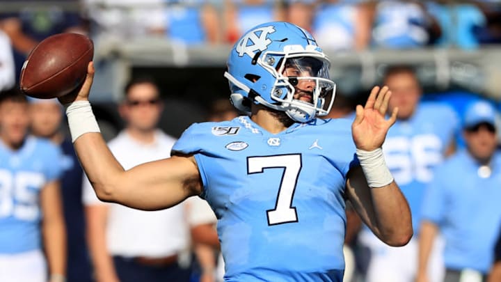 CHARLOTTE, NORTH CAROLINA - AUGUST 31: Sam Howell #7 of the North Carolina Tar Heels drops back to pass against the South Carolina Gamecocks during the Belk College Kickoff game at Bank of America Stadium on August 31, 2019 in Charlotte, North Carolina. (Photo by Streeter Lecka/Getty Images)