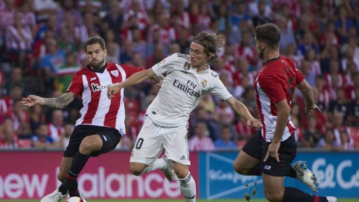 BILBAO, SPAIN - SEPTEMBER 15: Luka Modric of Real Madrid CF competes for the ball with Yeray of Athletic Club during the La Liga match between Athletic Club and Real Madrid Club de Futbol at San Mames stadium on September 15, 2018, in Bilbao, Spain. (Photo by Carlos Sanchez Martinez/Icon Sportswire via Getty Images)