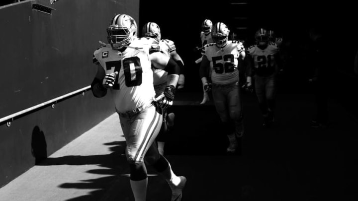 SEATTLE, WA - SEPTEMBER 23: Zack Martin #70 of the Dallas Cowboys and teammates take the field prior to taking on the Seattle Seahawks during their game at CenturyLink Field on September 23, 2018 in Seattle, Washington. (Photo by Abbie Parr/Getty Images)