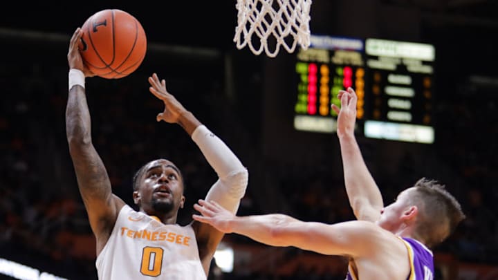 KNOXVILLE, TN - DECEMBER 29: Jordan Bone #0 of the Tennessee Volunteers shoots a lay up with Hunter Vick #20 of the Tennessee Tech Golden Eagles defending during the first half of the game between the Tennessee Tech Golden Eagles and the Tennessee Volunteers at Thompson-Boling Arena on December 29, 2018 in Knoxville, Tennessee. (Photo by Donald Page/Getty Images)