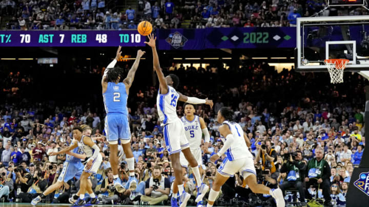 Apr 2, 2022; New Orleans, LA, USA; North Carolina Tar Heels guard Caleb Love (2) shoots the ball against Duke Blue Devils center Mark Williams (15) during the second half in the 2022 NCAA men's basketball tournament Final Four semifinals at Caesars Superdome. Mandatory Credit: Robert Deutsch-USA TODAY Sports