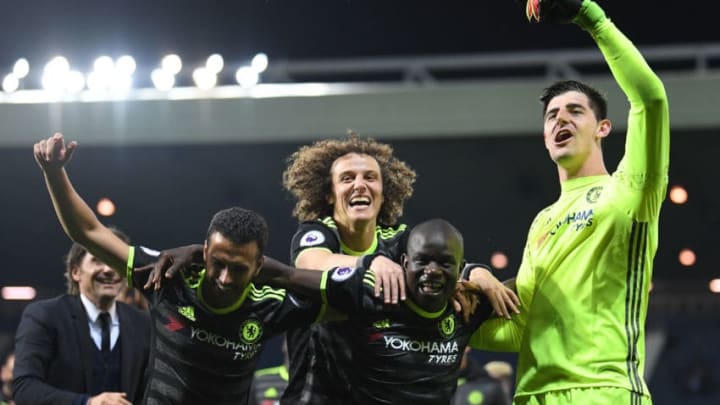 WEST BROMWICH, ENGLAND - MAY 12: l-r Antonio Conte, Pedro, David Luiz, N'Golo Kante and Thibaut Courtois of Chelsea celebrate winning the league during the Premier League match between West Bromwich Albion and Chelsea at The Hawthorns on May 12, 2017 in West Bromwich, England. (Photo by Laurence Griffiths/Getty Images)