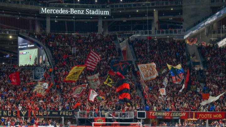 ATLANTA, GA NOVEMBER 11: Atlanta United fans wave flags during the MLS Eastern Conference semifinal match between Atlanta United and NYCFC on November 11th, 2018 at Mercedes-Benz Stadium in Atlanta, GA. Atlanta United FC defeated New York City FC by a score of 3 to 1 to advance in the playoffs. (Photo by Rich von Biberstein/Icon Sportswire via Getty Images)