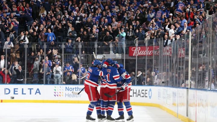 NEW YORK, NY - OCTOBER 03: The New York Rangers celebrate after an empty net goal in the third period by Brendan Smith #42 against the Winnipeg Jets at Madison Square Garden on October 3, 2019 in New York City. (Photo by Jared Silber/NHLI via Getty Images)