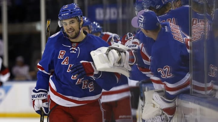 Oct 23, 2016; New York, NY, USA; New York Rangers right wing Josh Jooris (86) celebrates with teammates after scoring a goal during the first period against the Arizona Coyotes at Madison Square Garden. Mandatory Credit: Adam Hunger-USA TODAY Sports
