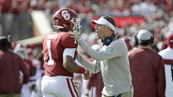 NORMAN, OK - SEPTEMBER 28: Head coach Lincoln Riley congratulates quarterback Jalen Hurts #1 of the Oklahoma Sooners after a touchdown against the Texas Tech Red Raiders at Gaylord Family Oklahoma Memorial Stadium on September 28, 2019 in Norman, Oklahoma. The Sooners defeated the Red Raiders 55-16. (Photo by Brett Deering/Getty Images)