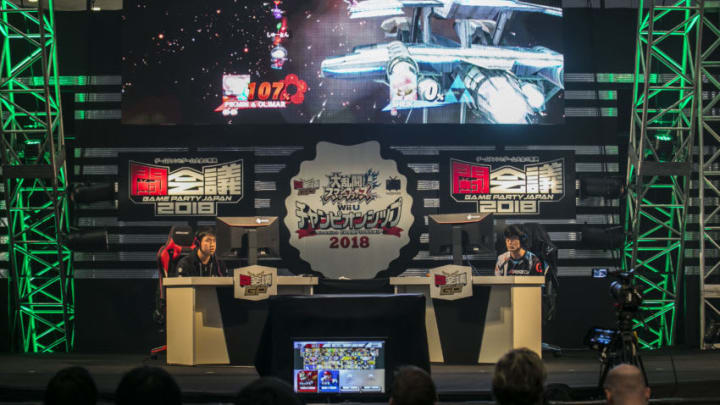 Participants play Nintendo Co.'s Super Smash Bros. Brawl game during the Tokaigi Game Party Japan esports competition at the Makuhari Messe convention center in Chiba, Japan, on Saturday, Feb. 10, 2018. Hundreds of players are facing off in the two-day competition for more than $300,000 in prizes and the top few dozen players will get licenses to play in paid video-game competitions in the future. Photographer: Shiho Fukada/Bloomberg via Getty Images