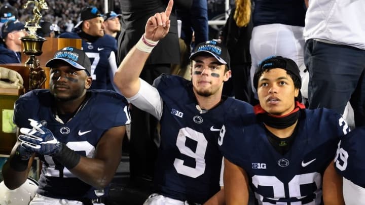 Nov 26, 2016; University Park, PA, USA; Penn State Nittany Lions quarterback Trace McSorley (9) celebrates with teammates wide receiver Chris Godwin (12) and cornerback John Reid (29) following the game against the Michigan State Spartans and winning the East Division Big Ten Championship at Beaver Stadium. The Nittany Lions won 45-12. Mandatory Credit: Rich Barnes-USA TODAY Sports