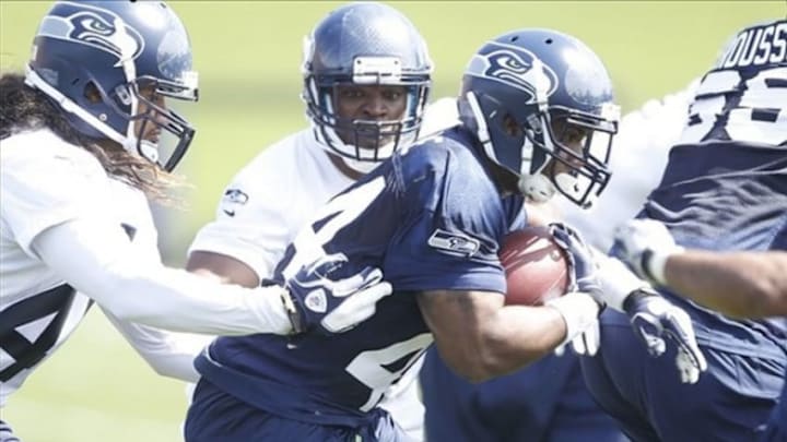 May 10, 2013; Renton, WA, USA; Seattle Seahawks fullback Spencer Ware (44) rushes during a rookie minicamp practice at the Virginia Mason Athletic Center. Mandatory Credit: Joe Nicholson-USA TODAY Sports
