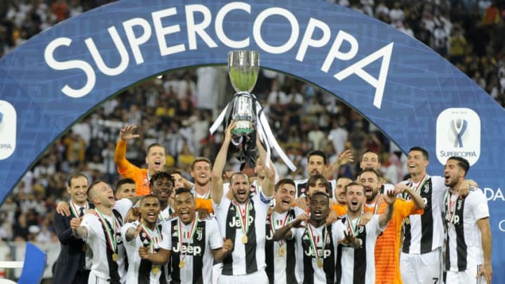 JEDDAH, SAUDI ARABIA - JANUARY 16: Giorgio Chiellini of Juventus lifts the trophy after winning thethe Italian Supercup match between Juventus and AC Milan at King Abdullah Sports City on January 16, 2019 in Jeddah, Saudi Arabia. (Photo by Marco Rosi/Getty Images for Lega Serie A)