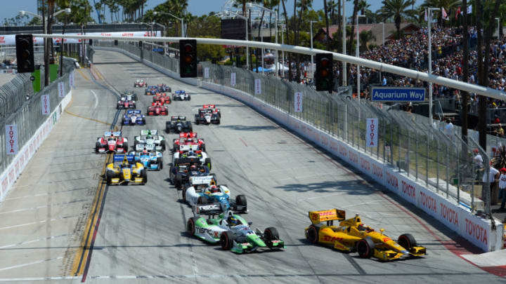 LONG BEACH, CA - APRIL 13: Ryan Hunter-Reay driver of the #28 Andretti Autosport Dallara Honda leads at the start of the Verizon IndyCar Series Toyota Grand Prix of Long Beach on April 13, 2014 on the streets of Long Beach, California. (Photo by Robert Laberge/Getty Images)