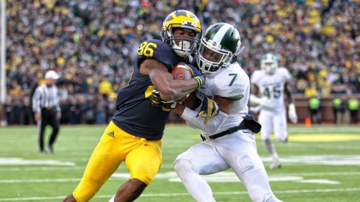Oct 17, 2015; Ann Arbor, MI, USA; Michigan Wolverines wide receiver Jehu Chesson (86) is defended by Michigan State Spartans defensive back Demetrious Cox (7) during the 2nd half of a game at Michigan Stadium. Mandatory Credit: Mike Carter-USA TODAY Sports