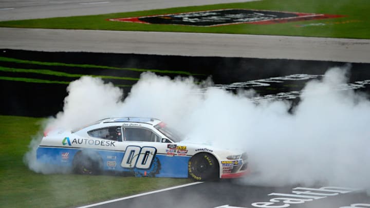 FORT WORTH, TX - NOVEMBER 03: Cole Custer, driver of the #00 Autodesk Ford, celebrates with a burnout after winning the NASCAR Xfinity Series O'Reilly Auto Parts 300 at Texas Motor Speedway on November 3, 2018 in Fort Worth, Texas. (Photo by Robert Laberge/Getty Images)