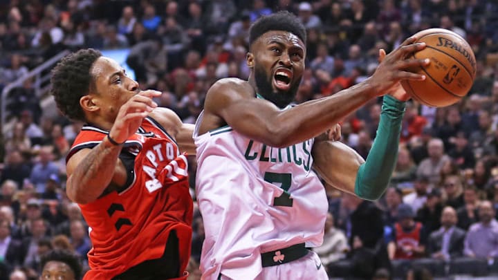 TORONTO, ON - FEBRUARY 6: Jaylen Brown #7 of the Boston Celtics battles against DeMar DeRozan #10 of the Toronto Raptors in an NBA game at the Air Canada Centre on February 6, 2018 in Toronto, Ontario, Canada. The Raptors defeated Celtics 111-91. NOTE TO USER: user expressly acknowledges and agrees by downloading and/or using this Photograph, user is consenting to the terms and conditions of the Getty Images Licence Agreement. (Photo by Claus Andersen/Getty Images)
