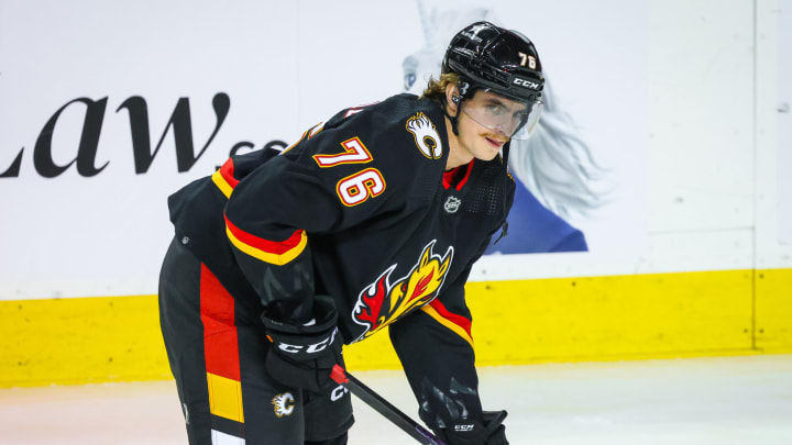 Martin Pospisil wearing Calgary Flames Blasty alternate uniform.