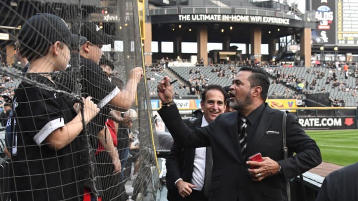 Oct 10, 2021; Chicago, Illinois, USA; Chicago White Sox former manager Ozzie Guillen signs autographs before game three of the 2021 ALDS against the Houston Astros at Guaranteed Rate Field. Mandatory Credit: Matt Marton-USA TODAY Sports