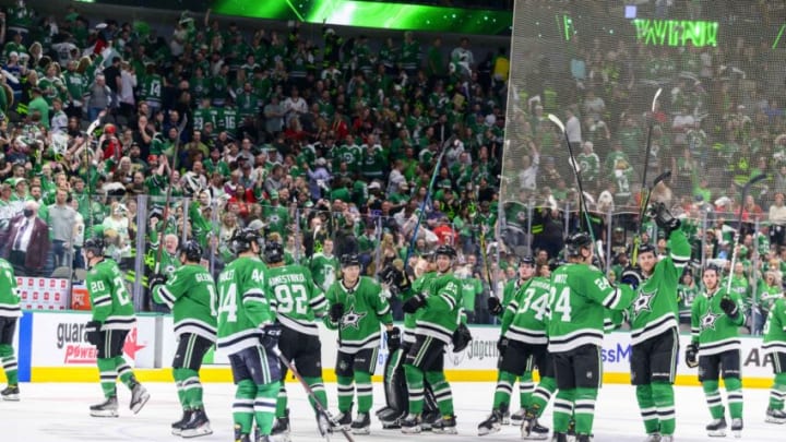 May 7, 2022; Dallas, Texas, USA; The Dallas Stars team and Stars fans celebrate the win over the Calgary Flames in game three of the first round of the 2022 Stanley Cup Playoffs at American Airlines Center. Mandatory Credit: Jerome Miron-USA TODAY Sports