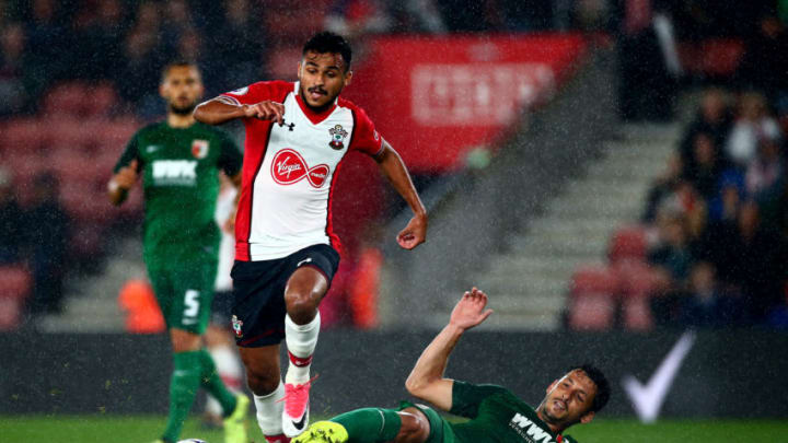 SOUTHAMPTON, ENGLAND – AUGUST 02: Sofiane Boufal of Southamton is tackled by Gojko Kacar of FC Augsburg during the Pre-Season Friendly match between Southampton and FC Augsburg at St Mary’s Stadium on August 2, 2017 in Southampton, England. (Photo by Jordan Mansfield/Getty Images)