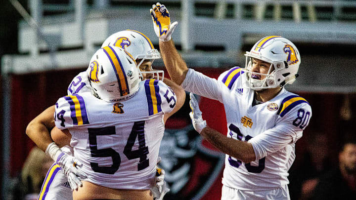 Tennessee Tech Golden Eagles running back David Gist (21) is celebrated after his touchdown during the second half at Fortera Stadium Saturday, Oct. 27, 2018, in Clarksville, Tenn.P1 5662