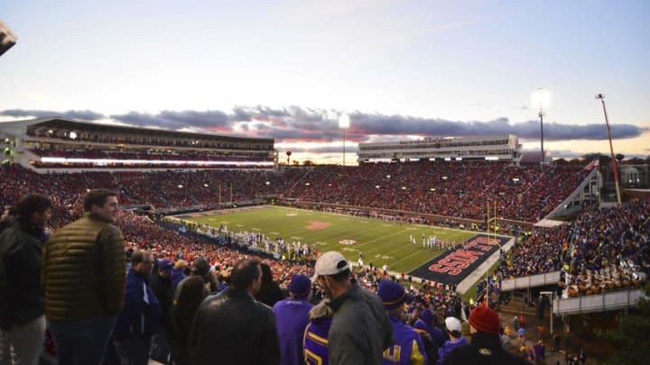Nov 21, 2015; Oxford, MS, USA; The sun sets as fans watch the action between the Mississippi Rebels and LSU Tigers during the third quarter of the game at Vaught-Hemingway Stadium. Mississippi won 38-17. Mandatory Credit: Matt Bush-USA TODAY Sports