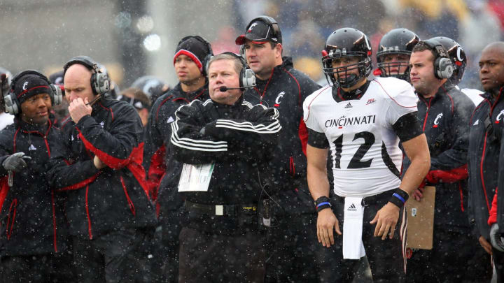 PITTSBURGH – DECEMBER 5: Head Coach Brian Kelly and quarterback Zach Collaros #12 of the University of Cincinnati Bearcats stand on the field during the game against the University of Pittsburgh Panthers at Heinz Field on December 5, 2009, in Pittsburgh, Pennsylvania. Cincinnati won 45-44. (Photo by Ned Dishman/Getty Images)