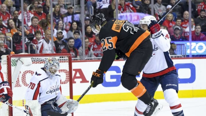 WASHINGTON, DC - MARCH 24: Philadelphia Flyers left wing James van Riemsdyk (25) leaps out of the way of second period shot against Washington Capitals goaltender Braden Holtby (70) on March 24, 2019, at the Capital One Arena in Washington, D.C. (Photo by Mark Goldman/Icon Sportswire via Getty Images)