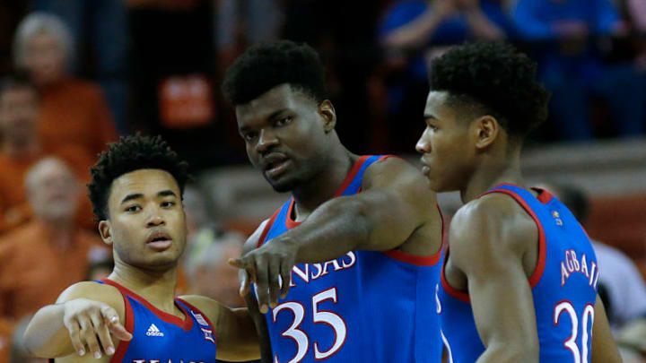 Devon Dotson #1, Udoka Azubuike #35 and Ochai Agbaji #30 of Kansas basketball talk strategy. (Photo by Chris Covatta/Getty Images)