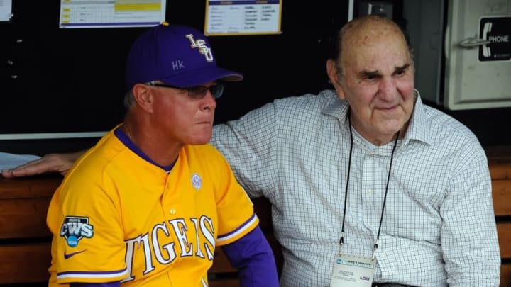 Jun 18, 2015; Omaha, NE, USA; LSU Tigers head coach Paul Mainieri talks with former head coach Skip Bertman prior to the game against the TCU Horned Frogs in the 2015 College World Series at TD Ameritrade Park. Mandatory Credit: Steven Branscombe-USA TODAY Sports