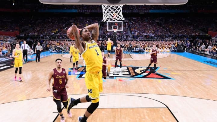 SAN ANTONIO, TX - MARCH 31: Charles Matthews #1 of the Michigan Wolverines goes up for a dunk in the second half against the Loyola Ramblers in the 2018 NCAA Men's Final Four semifinal game at the Alamodome on March 31, 2018 in San Antonio, Texas. (Photo by Jamie Schwaberow - Pool/Getty Images)