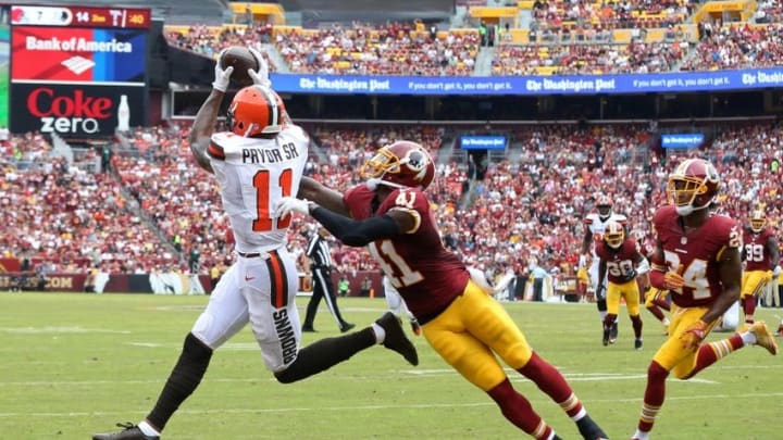 Oct 2, 2016; Landover, MD, USA; Cleveland Browns wide receiver Terrelle Pryor (11) catches a touchdown pass as Washington Redskins safety Will Blackmon (41) defends in the second quarter at FedEx Field. Mandatory Credit: Geoff Burke-USA TODAY Sports